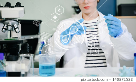 A senior female scientist analyzes clinical data using a futuristic digital HUD graphics interface in a high-tech biotechnology laboratory. A senior female scientist analyzes clinical data using a futuristic digital HUD graphics interface in a high-tech biotechnology laboratory. 140871528