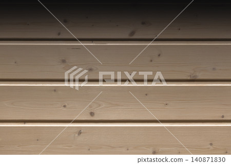 Light brown horizontal wooden siding panels with visible knots Light brown horizontal wooden siding panels with visible knots 140871830