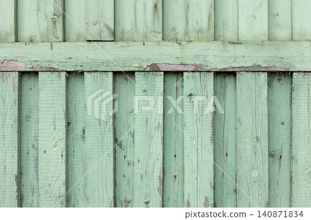 A weathered mint green wooden fence panel, photo texture A weathered mint green wooden fence panel, photo texture 140871834
