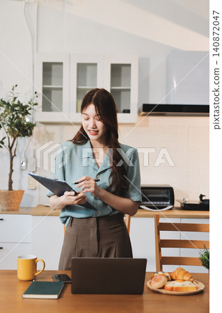 Young adult asian business woman using laptop chat digital artificial intelligence assistance ai chatbot prompt analysis work modern lifestyles Young adult asian business woman using laptop chat digital artificial intelligence assistance ai chatbot prompt analysis work modern lifestyles 140872047