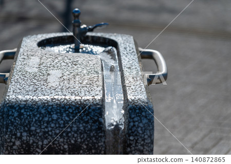 Frozen winter park drinking fountain Frozen winter park drinking fountain 140872865