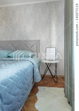 Cozy Bedroom Corner with Bedside Table and Mockup Frame 140873119