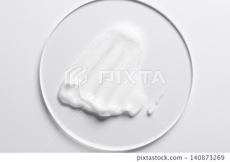 A sample of a cosmetic product. A moisturizing gel or shaving cream or body milk. A sample of a cosmetic product. A moisturizing gel or shaving cream or body milk. 140873269