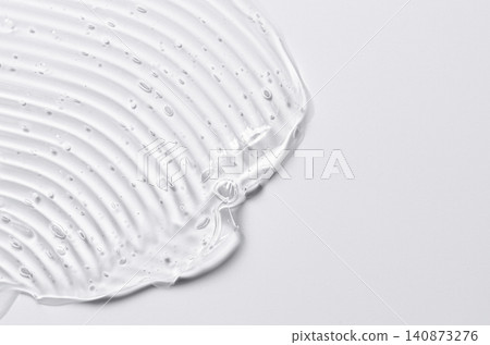 Texture background of transparent body cosmetics. Copy space Texture background of transparent body cosmetics. Copy space 140873276