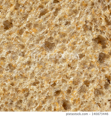 Full frame view of fresh baked porous rye bread structure close-up Full frame view of fresh baked porous rye bread structure close-up 140873446