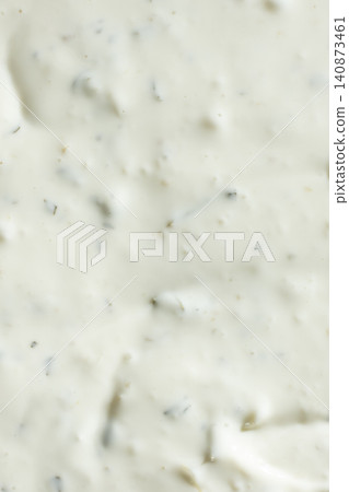 Creamy mayonnaise dressing with chopped herbs top view Creamy mayonnaise dressing with chopped herbs top view 140873461