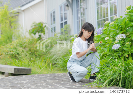 Elementary school students observing plants Elementary school students observing plants 140873712