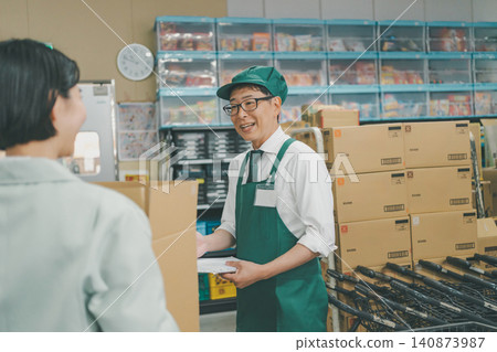 Supermarket receiving staff Supermarket receiving staff 140873987