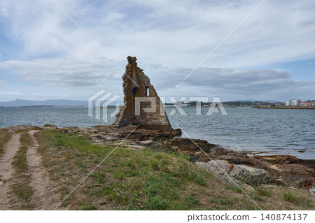 The ruins of the Tower of San Sadurnino rise above the sea on the islet of A Figueira, Cambados, Galicia The ruins of the Tower of San Sadurnino rise above the sea on the islet of A Figueira, Cambados, Galicia 140874137