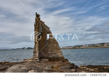 The ruins of the Tower of San Sadurnino rise above the sea on the islet of A Figueira, Cambados, Galicia The ruins of the Tower of San Sadurnino rise above the sea on the islet of A Figueira, Cambados, Galicia 140874138