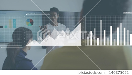 Presenting woman wearing light shirt explaining data at conference room with monitor overlays 140875031