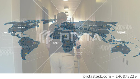 Walking senior man wearing dark vest, using cane along care facility corridor, with map overlay Walking senior man wearing dark vest, using cane along care facility corridor, with map overlay 140875229