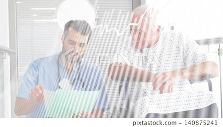Reading green chart, clinician in scrubs pointing, patient in gown sitting in wheelchair in clinic Reading green chart, clinician in scrubs pointing, patient in gown sitting in wheelchair in clinic 140875241
