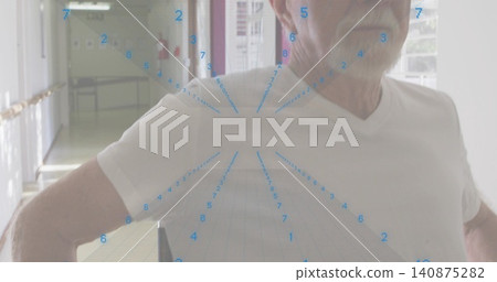 Standing senior man wearing white V-neck tee looking ahead in care corridor with chair grid overlay Standing senior man wearing white V-neck tee looking ahead in care corridor with chair grid overlay 140875282