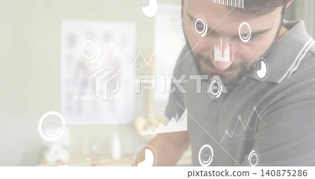 Leaning, male with short beard wearing grey polo studying holographic charts in clinic, copy space Leaning, male with short beard wearing grey polo studying holographic charts in clinic, copy space 140875286