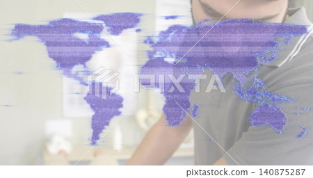 Featuring purple translucent world map glitch bands over office workspace, showing man in grey polo Featuring purple translucent world map glitch bands over office workspace, showing man in grey polo 140875287