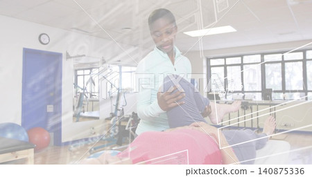 Female clinician supporting patient bent knee on treatment table at clinic, in light zip-up, HUD Female clinician supporting patient bent knee on treatment table at clinic, in light zip-up, HUD 140875336