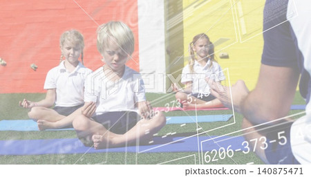 Meditating blond boy sitting cross-legged on blue mat at school playground, wearing white shirt Meditating blond boy sitting cross-legged on blue mat at school playground, wearing white shirt 140875471