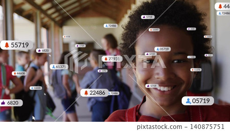 Smiling student in red top with backpack strap standing in school hall, overlay badges, copy space Smiling student in red top with backpack strap standing in school hall, overlay badges, copy space 140875751