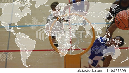 Driving player in dark jersey holding ball above rim at gymnasium court, with world-map overlay Driving player in dark jersey holding ball above rim at gymnasium court, with world-map overlay 140875899