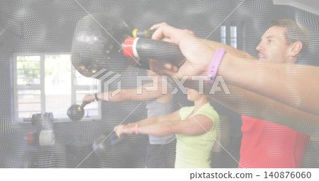 Lifting four members holding kettlebells and extending arms at studio windows, redshirt, overlay Lifting four members holding kettlebells and extending arms at studio windows, redshirt, overlay 140876060
