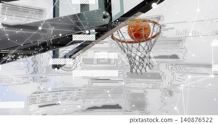 Passing orange basketball through rim and backboard in gym near arm, vent, overlay, copy space Passing orange basketball through rim and backboard in gym near arm, vent, overlay, copy space 140876522