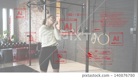 Adjusting earbud woman in athletic clothing standing near pull-up rig at gym, with HUD overlays Adjusting earbud woman in athletic clothing standing near pull-up rig at gym, with HUD overlays 140876780
