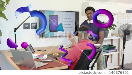 Pointing man in red shirt presenting app mockup on wall display at office with purple AR 140876891