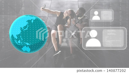 Taking selfie couple wearing black dress and T-shirt, holding phone in lobby with AR globe Taking selfie couple wearing black dress and T-shirt, holding phone in lobby with AR globe 140877202