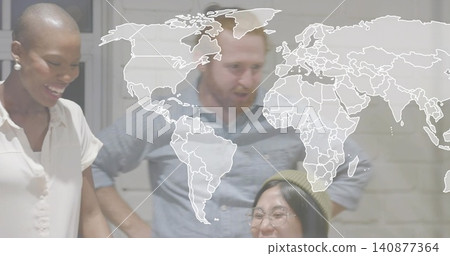Leaning team smiling, looking down in office, wearing olive beanie, glasses, world map overlay 140877364