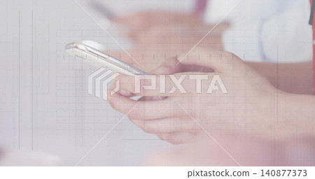 Holding pair of hands typing on smartphone in clinic, with clear case, white coat and stethoscope Holding pair of hands typing on smartphone in clinic, with clear case, white coat and stethoscope 140877373