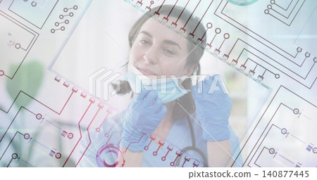 Pulling nurse lowering surgical mask in clinic, wearing blue scrubs, gloves, circuit overlay Pulling nurse lowering surgical mask in clinic, wearing blue scrubs, gloves, circuit overlay 140877445