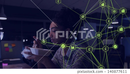 Holding white takeout container, woman wearing gray sweater eating at dim office, network overlay Holding white takeout container, woman wearing gray sweater eating at dim office, network overlay 140877611