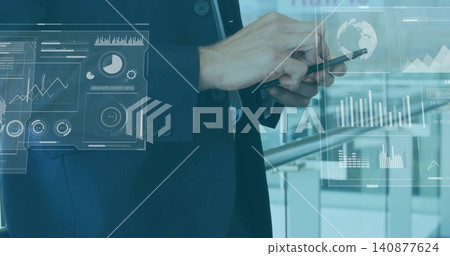 Tapping touchscreen device, mature man in suit jacket and tie viewing holographic data at office Tapping touchscreen device, mature man in suit jacket and tie viewing holographic data at office 140877624