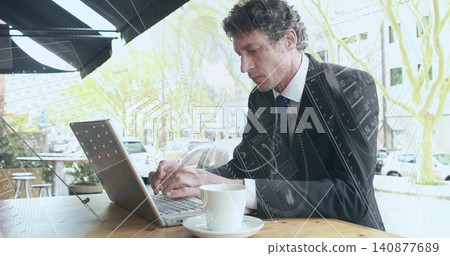 Working professional in suit and tie at street cafe using laptop and sipping coffee, copy space Working professional in suit and tie at street cafe using laptop and sipping coffee, copy space 140877689
