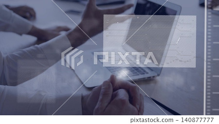 Showing clasped hands of man wearing light shirt, resting on conference table with laptop overlays Showing clasped hands of man wearing light shirt, resting on conference table with laptop overlays 140877777