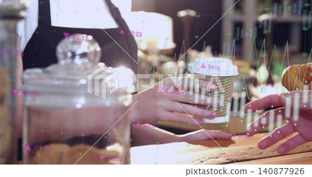 Handing paper takeaway cup between people wearing dark top at wooden counter with glass jar, charts Handing paper takeaway cup between people wearing dark top at wooden counter with glass jar, charts 140877926