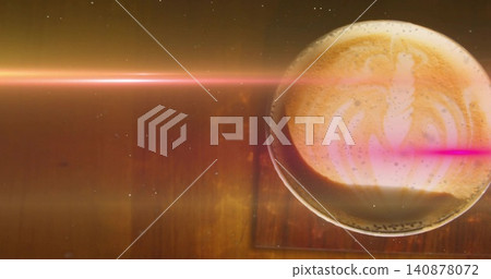 Showing ceramic cup with rosetta art on square coaster, wood table, pink flare specks, copy space Showing ceramic cup with rosetta art on square coaster, wood table, pink flare specks, copy space 140878072