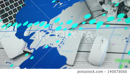 Showing spiral notebook lying open on wooden desk with white mouse, laptop, flowers, blue overlay Showing spiral notebook lying open on wooden desk with white mouse, laptop, flowers, blue overlay 140878088
