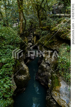 Visit Martvili Canyon in Georgia to explore clear blue water and lush green surroundings Visit Martvili Canyon in Georgia to explore clear blue water and lush green surroundings 140878341