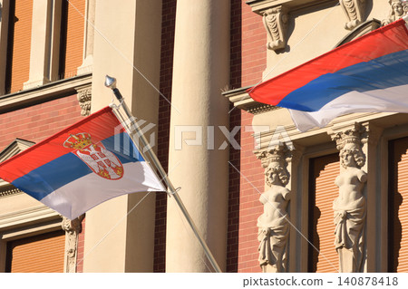 Serbian flags on historic building facade Serbian flags on historic building facade 140878418