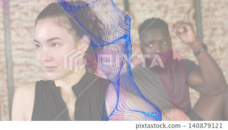 Sitting woman on left wearing black zip-front top in studio with digital mesh overlay, copy space Sitting woman on left wearing black zip-front top in studio with digital mesh overlay, copy space 140879121