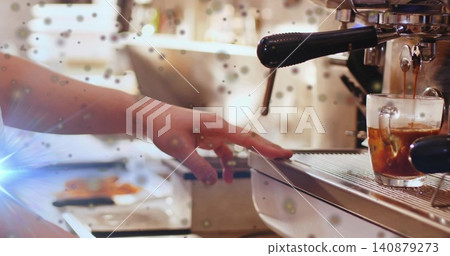 Steadying barista arm in short-sleeve shirt adjusting shot glass on coffee counter with portafilter Steadying barista arm in short-sleeve shirt adjusting shot glass on coffee counter with portafilter 140879273