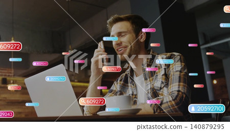 Talking man typing on laptop holding phone at cafe, wearing plaid shirt, coffee cup, AR bubbles Talking man typing on laptop holding phone at cafe, wearing plaid shirt, coffee cup, AR bubbles 140879295