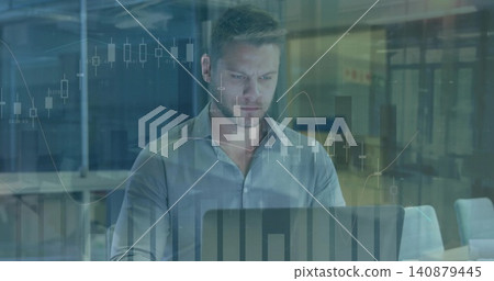 Working man wearing light collared shirt analyzing candlestick, line charts on laptop at office Working man wearing light collared shirt analyzing candlestick, line charts on laptop at office 140879445