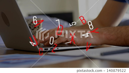 Typing man wearing blue shirt using silver laptop at home desk with mug, papers, red-white overlay Typing man wearing blue shirt using silver laptop at home desk with mug, papers, red-white overlay 140879522
