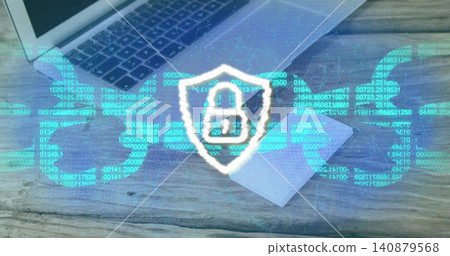 Displaying shield with padlock icon over desk, with laptop, phone on envelope, world map and code Displaying shield with padlock icon over desk, with laptop, phone on envelope, world map and code 140879568