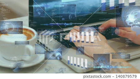 Typing hands wearing long sleeve garment coding on laptop at desk, with coffee cup, data overlays 140879579