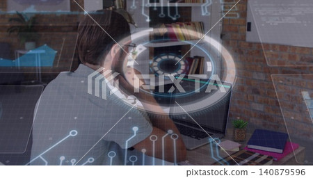 Working man with glasses wearing grey t-shirt typing on laptop at home office, HUD overlay Working man with glasses wearing grey t-shirt typing on laptop at home office, HUD overlay 140879596