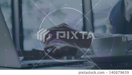 Typing man wearing button shirt and watch using laptop keyboard at office desk, HUD overlay, saucer Typing man wearing button shirt and watch using laptop keyboard at office desk, HUD overlay, saucer 140879639
